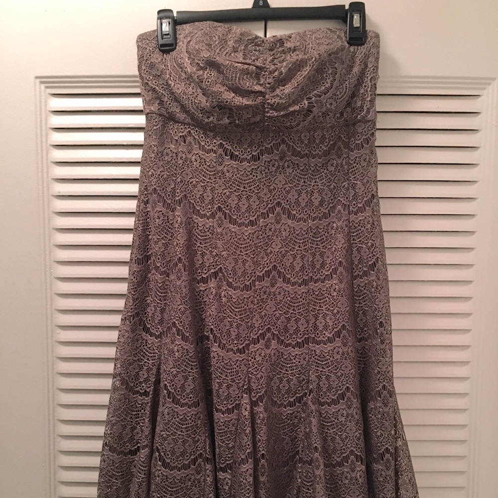 Pewter/silver color lace strapless dress.